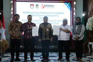 Penandatangan MoU dana hibah Pilkada Purwakarta--