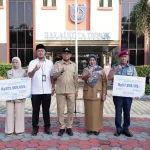 Pemberian santunan jaminan ketenagakerjaan kepada pegawai non-ASN Pemkot Depok (Foto: Dok. BPJS Ketenagakerjaan Depok)