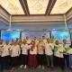 Peserta sosialisasi BPJS Ketenagakerjaan Kota Depok berfoto bersama usai kegiatan perlindungan jaminan sosial bagi pekerja rentan melalui program DBH CHT 2025.