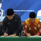 Penandatanganan MoU antara Wali Kota Bandung dan Rektor Unisba dalam seminar nasional pengelolaan sampah berbasis nilai Islam.