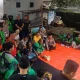 Kapolres Purwakarta bersama driver ojol dalam aksi damai mengenang Affan Kurniawan.