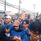 Suasana ribuan warga mengikuti Fun Run HUT ke-14 NasDem Purwakarta yang menyediakan hadiah motor listrik.