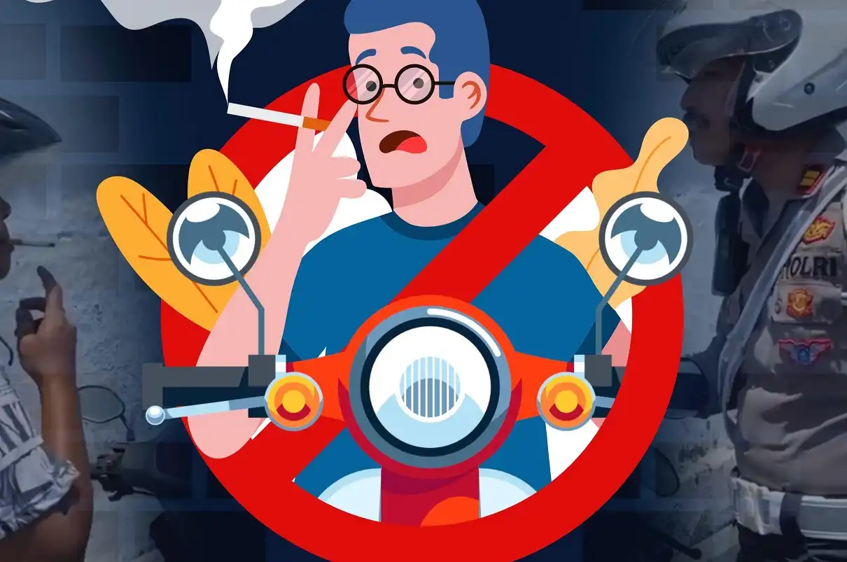 Petugas Satlantas Polres Garut memberi imbauan pengendara agar tidak merokok saat berkendara.