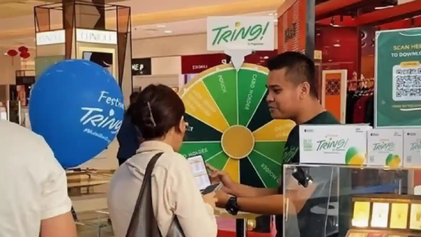 Suasana edukasi investasi emas dan promosi Tabungan Emas di Festival Tring Pegadaian Bandung PVJ.