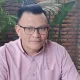 Pengacara Roni Sonbay Fransisco Bessi usai diperiksa Kejati NTT